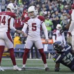 Arizona Cardinals kicker Matt Prater (5) is congratulated by Andy Lee (14) on Prater's 53-yard field goal against the Seattle Seahawks during the second half of an NFL football game, Sunday, Nov. 21, 2021, in Seattle. (AP Photo/Ted S. Warren)