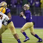 Washington quarterback Dylan Morris drops back to pass against Arizona State during the first half of an NCAA college football game Saturday, Nov. 13, 2021, in Seattle. (AP Photo/Elaine Thompson)