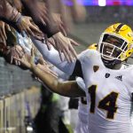 Arizona State's Stanley Lambert greets fans after the team's 35-30 win over Washington in an NCAA college football game Saturday, Nov. 13, 2021, in Seattle. (AP Photo/Elaine Thompson)