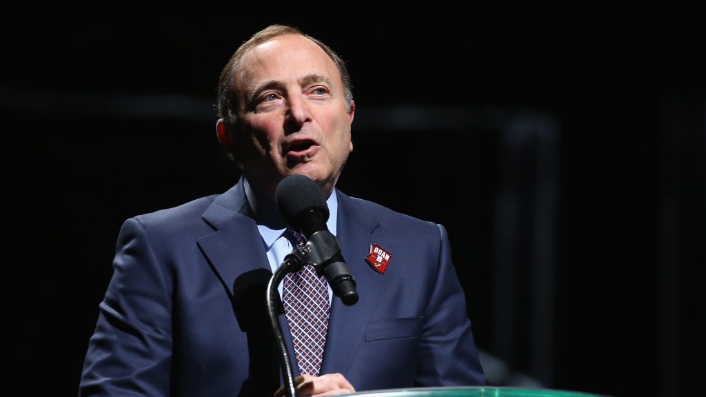 NHL commissioner Gary Bettman speaks during a pregame ceremony to honor Shane Doan and retire his j...