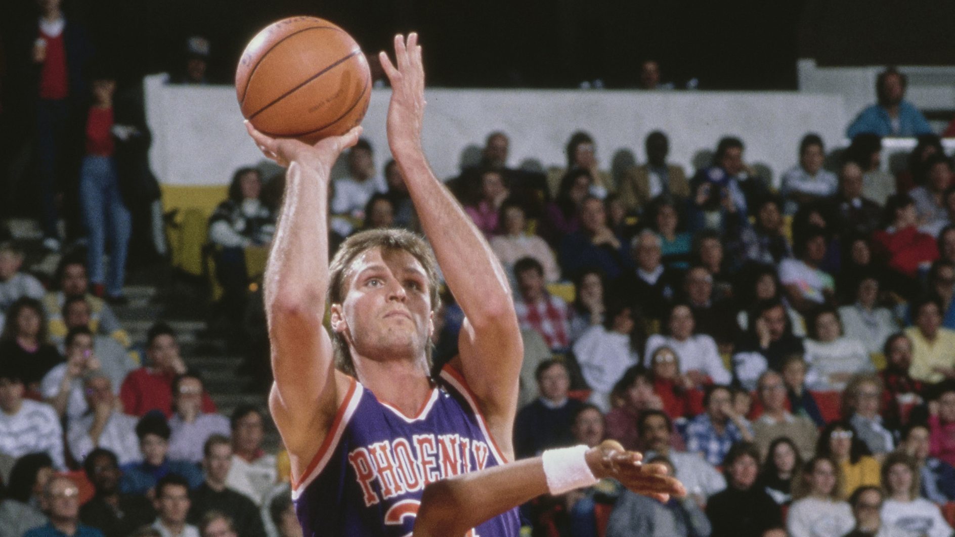 Tom Chambers #24, Power Forward for the Phoenix Suns attempts a three point jump shot to the basket...