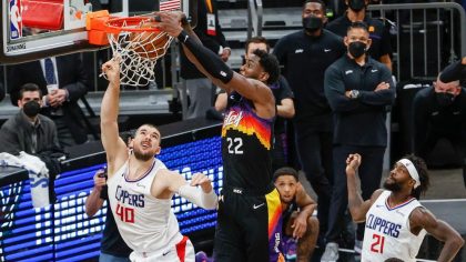 Deandre Ayton #22 of the Phoenix Suns dunks the ball over Ivica Zubac #40 of the LA Clippers  durin...