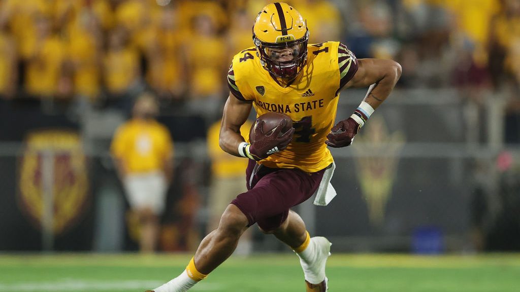 Wide receiver Johnny Wilson #14 of the Arizona State Sun Devils runs with the football against the ...