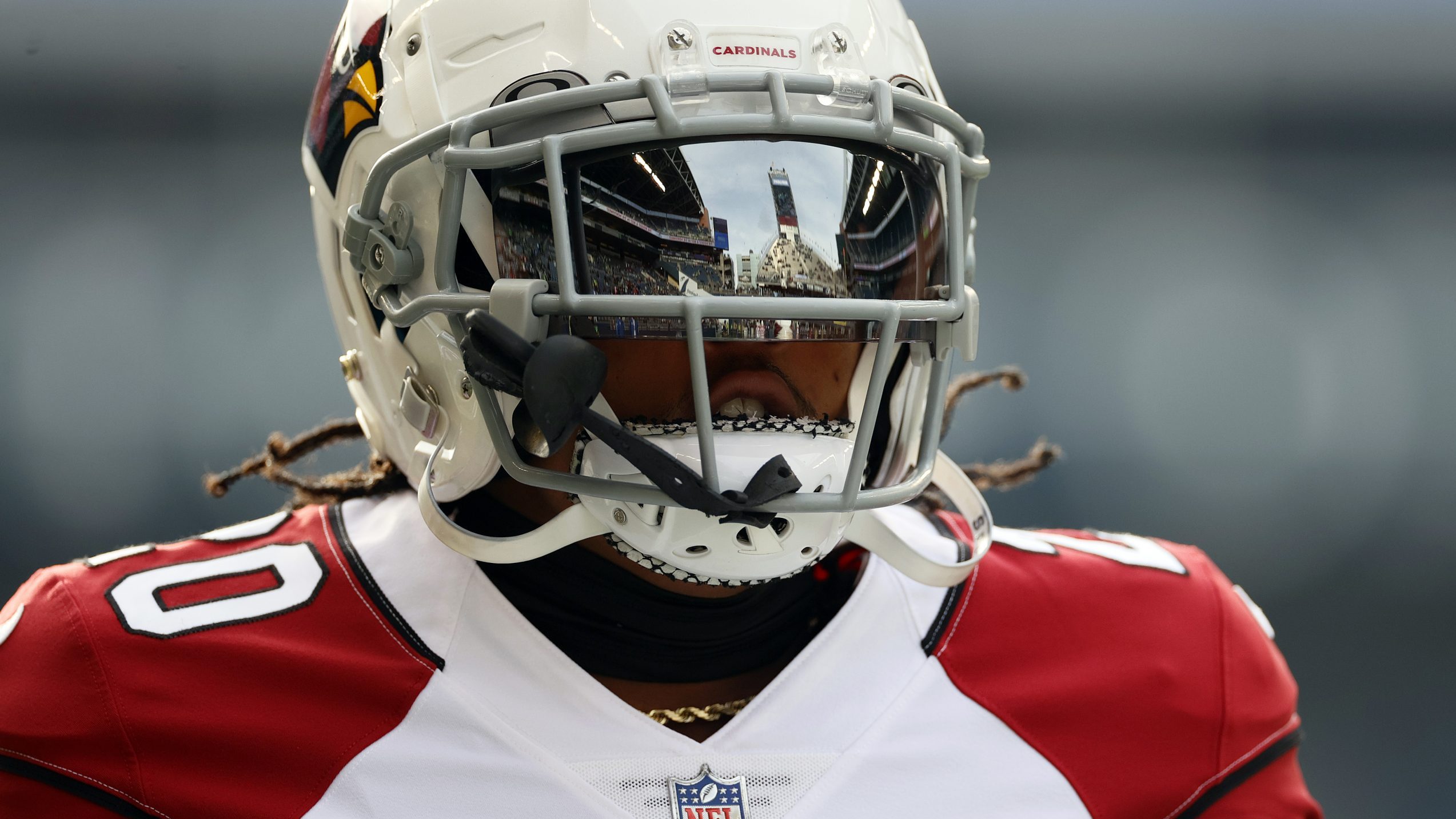 Marco Wilson #20 of the Arizona Cardinals warms-up before the game against the Seattle Seahawks at ...