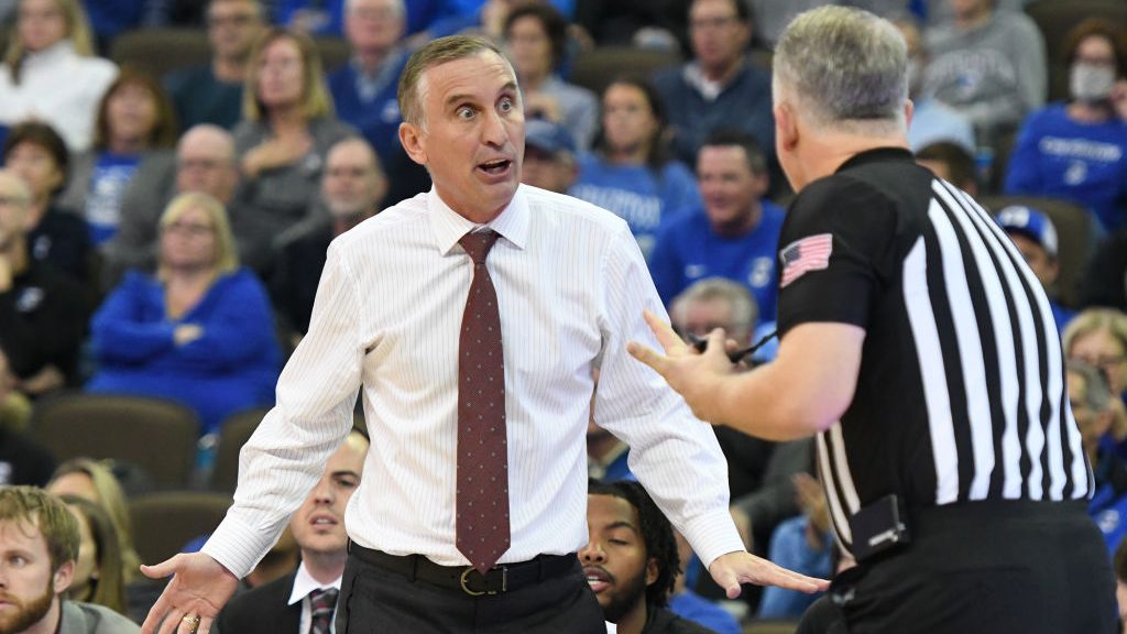Head coach Bobby Hurley of the Arizona State Sun Devils disputes a call with referee John Gaffney i...