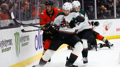 Ryan Getzlaf #15 of the Anaheim Ducks pushes Blake Speers #46 of the Arizona Coyotes during the thi...