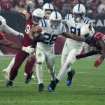 Indianapolis Colts running back Jonathan Taylor (28) runs against the Arizona Cardinals during the second half of an NFL football game, Saturday, Dec. 25, 2021, in Glendale, Ariz. (AP Photo/Rick Scuteri)