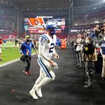Indianapolis Colts quarterback Carson Wentz (2) leaves the field after an NFL football game against the Arizona Cardinals, Saturday, Dec. 25, 2021, in Glendale, Ariz. The Colts won 22-16. (AP Photo/Ross D. Franklin)
