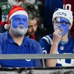 Indianapolis Colts fans watch during the second half of an NFL football game against the Arizona Cardinals, Saturday, Dec. 25, 2021, in Glendale, Ariz. (AP Photo/Ross D. Franklin)