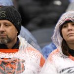 Chicago Bears fans watch their team play against the Arizona Cardinals during the first half of an NFL football game Sunday, Dec. 5, 2021, in Chicago. (AP Photo/Nam Y. Huh)