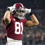 Alabama tight end Cameron Latu (81) celebrates after a touchdown catch against Cincinnati during the second half of the Cotton Bowl NCAA College Football Playoff semifinal game, Friday, Dec. 31, 2021, in Arlington, Texas. (AP Photo/Jeffrey McWhorter)