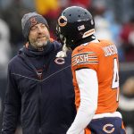 Chicago Bears head coach Matt Nagy, left, listens to free safety Eddie Jackson during warm ups before an NFL football game against the Arizona Cardinals Sunday, Dec. 5, 2021, in Chicago. (AP Photo/Nam Y. Huh)
