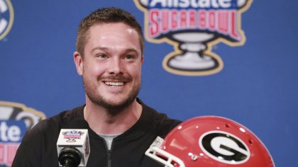 Dan Lanning, assistant coach outside linebackers, takes questions during a news conference on Satur...