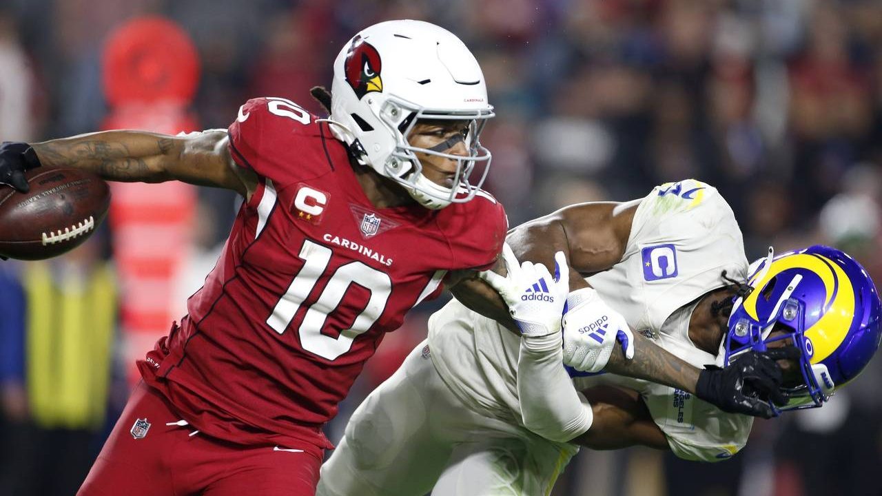 Arizona Cardinals wide receiver DeAndre Hopkins (10) gives Los Angeles Rams safety Jordan Fuller a ...