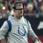 Indianapolis Colts head coach Frank Reich watches during the first half of an NFL football game against the Arizona Cardinals, Saturday, Dec. 25, 2021, in Glendale, Ariz. (AP Photo/Rick Scuteri)