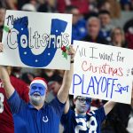 Indianapolis Colts fans cheer during the second half of an NFL football game against the Arizona Cardinals, Saturday, Dec. 25, 2021, in Glendale, Ariz. The Colts won 22-16. (AP Photo/Ross D. Franklin)