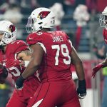 Arizona Cardinals wide receiver Antonie Wesley, left, celebrates his touchdown against the Indianapolis Colts during the second half of an NFL football game, Saturday, Dec. 25, 2021, in Glendale, Ariz. (AP Photo/Ross D. Franklin)