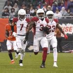 Arizona Cardinals safety Budda Baker (3) heads downfield after intercepting a pass by Chicago Bears quarterback Andy Dalton during the first half of an NFL football game Sunday, Dec. 5, 2021, in Chicago. (AP Photo/David Banks)
