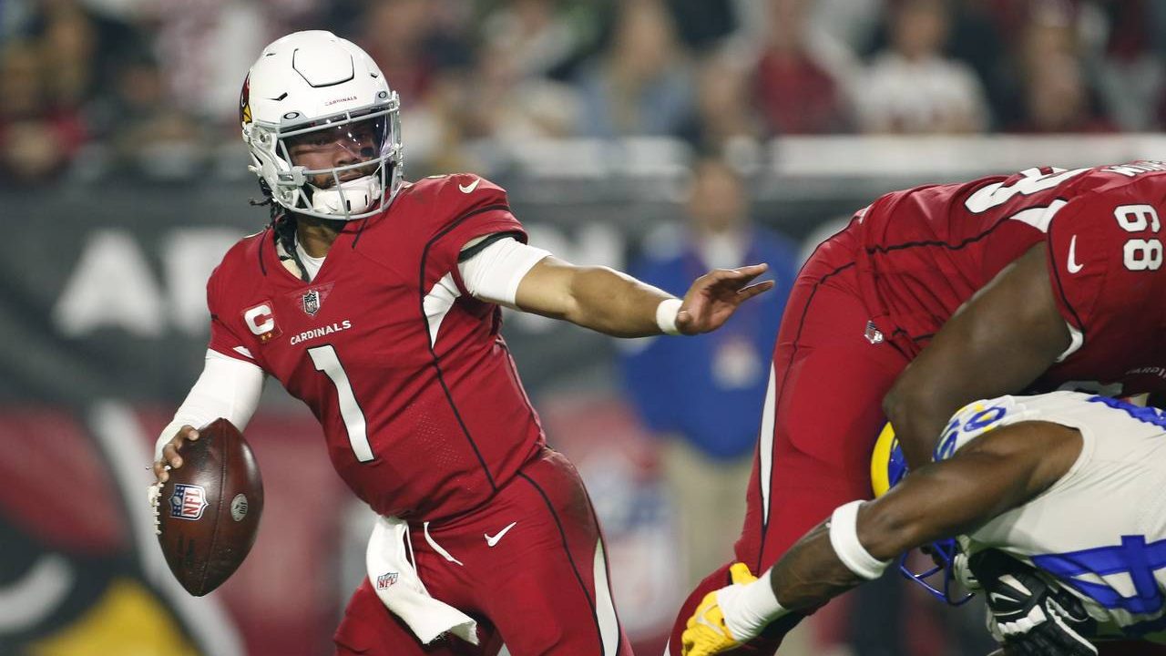 Arizona Cardinals quarterback Kyler Murray looks for running room against the Los Angeles Rams duri...