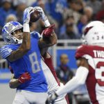Detroit Lions wide receiver Josh Reynolds (8) catches a 22-yard pass for a touchdown during the first half of an NFL football game against the Arizona Cardinals, Sunday, Dec. 19, 2021, in Detroit. (AP Photo/Jose Juarez)