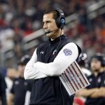 Cincinnati coach Luke Fickell watches from the sideline during the first half of the Cotton Bowl NCAA College Football Playoff semifinal game against Alabama, Friday, Dec. 31, 2021, in Arlington, Texas. (AP Photo/Michael Ainsworth)