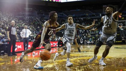 Arizona State guard DJ Horne (0) drives against Oregon during an NCAA college basketball game in Eu...