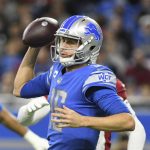 Detroit Lions quarterback Jared Goff scrambles during the first half of an NFL football game against the Arizona Cardinals, Sunday, Dec. 19, 2021, in Detroit. (AP Photo/Lon Horwedel)