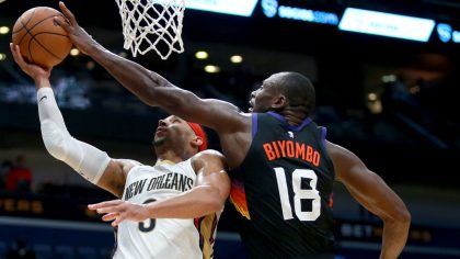 Bismack Biyombo #18 of the Phoenix Suns blocks the shot of Josh Hart #3 of the New Orleans Pelicans...