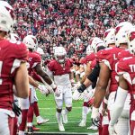 Cardinals QB Kyler Murray announced to the crowd and goes throw high five line 1/09/22 (Jeremy Schnell/Arizona Sports)