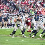 Seahawks QB Russell Wilson drops back to pass 1/09/22 (Jeremy Schnell/Arizona Sports)
