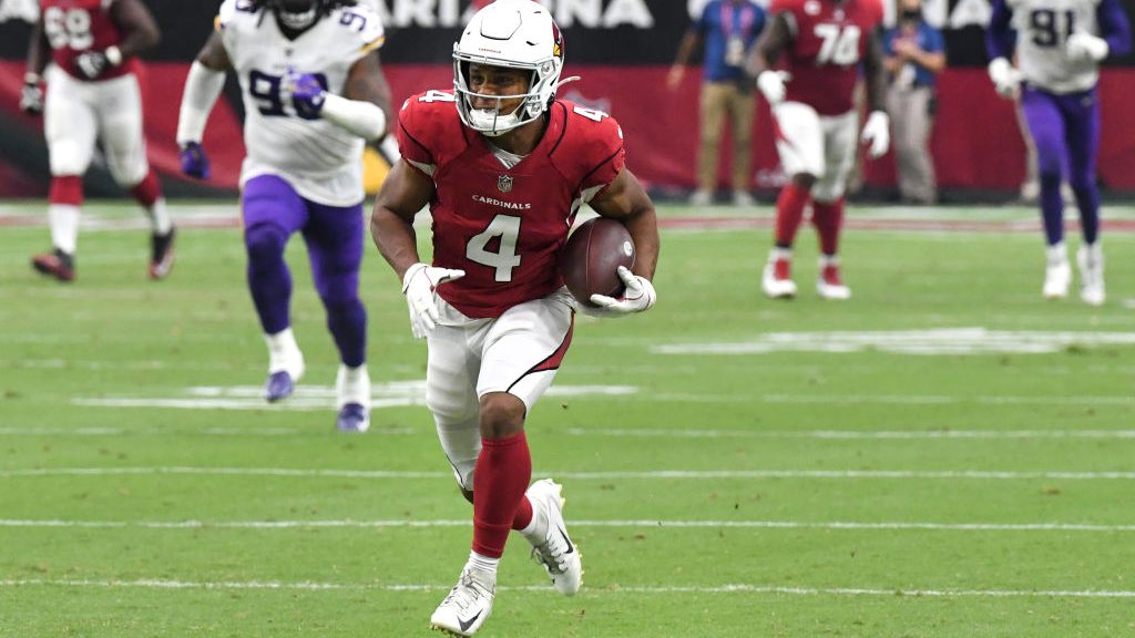 Rondale Moore #4 of the Arizona Cardinals runs with the after the catch for a touchdown against the...