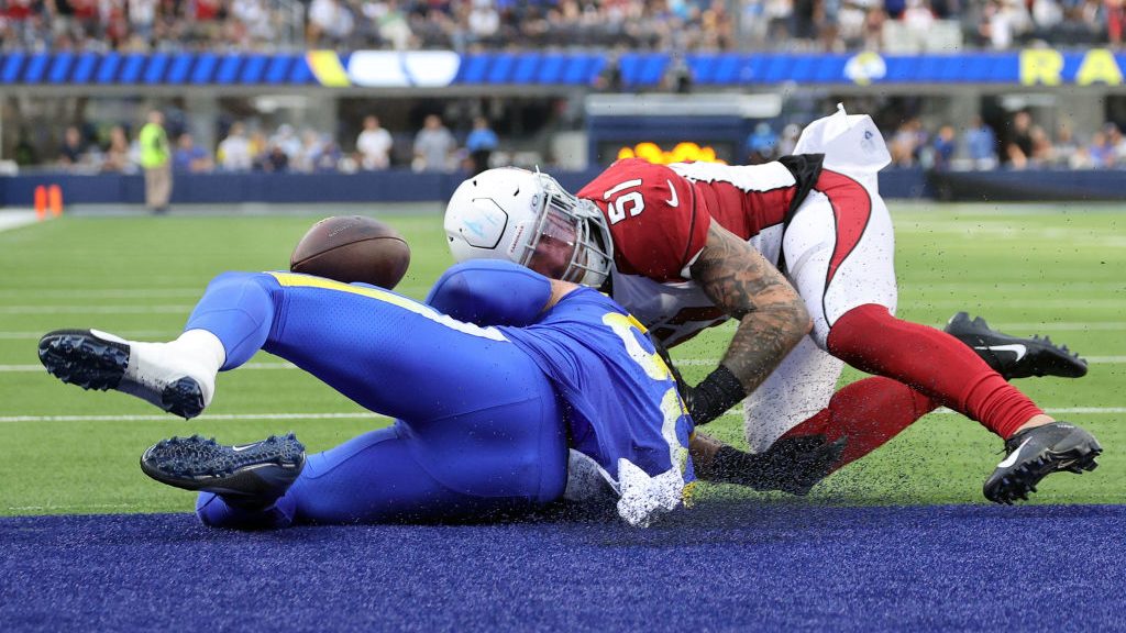 Tanner Vallejo #51 of the Arizona Cardinals breaks up a pass to Tyler Higbee #89 of the Los Angeles...