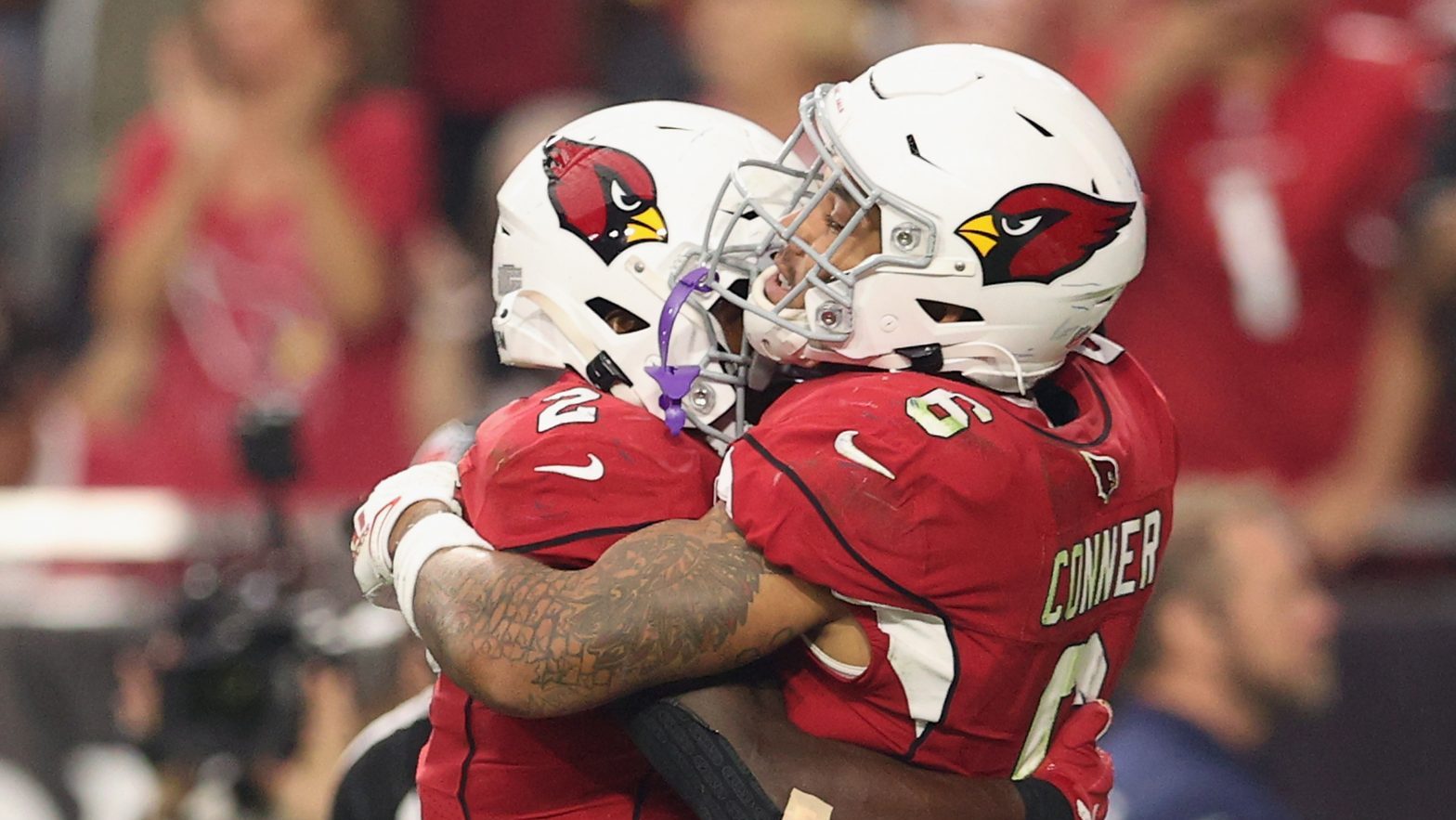 Running back James Conner #6 of the Arizona Cardinals celebrates with Chase Edmonds #2 after a 18-y...