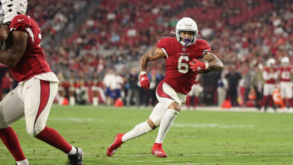 Running back James Conner #6 of the Arizona Cardinals scores on a 11-yard rushing touchdown against...