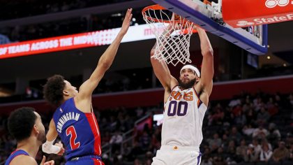JaVale McGee #00 of the Phoenix Suns dunks the ball in the second half against the Detroit Pistons ...