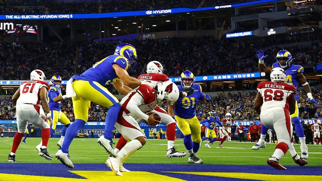 Kyler Murray #1 of the Arizona Cardinals is tackled by by Leonard Floyd #54 of the Los Angeles Rams...