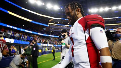 Kyler Murray #1 of the Arizona Cardinals walks off the field after losing to the Los Angeles Rams 3...