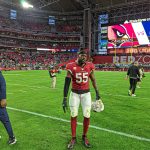 Cardinals LB Chandler Jones walks on the field after the loss to the Seahawks 1/09/22 (Jeremy Schnell/Arizona Sports)