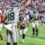 Seahawks WR Freddie Swain excited as QB Russell Wilson lunges for the endzone 1/09/22 (Jeremy Schnell/Arizona Sports)