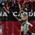 Seahawks QB Russell Wilson high fives fans postgame 1/09/22 (Jeremy Schnell/Arizona Sports)