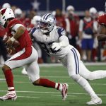 Arizona Cardinals quarterback Kyler Murray (1) is sacked by Dallas Cowboys defensive end Dorance Armstrong (92) during the second half of an NFL football game Sunday, Jan. 2, 2022, in Arlington, Texas. (AP Photo/Ron Jenkins)