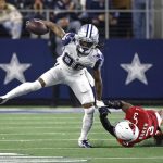 Dallas Cowboys wide receiver CeeDee Lamb (88) breaks away from Arizona Cardinals safety Budda Baker (3) during the second half of an NFL football game Sunday, Jan. 2, 2022, in Arlington, Texas. (AP Photo/Ron Jenkins)