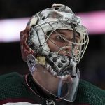 Arizona Coyotes goaltender Ivan Prosvetov looks on against the Colorado Avalanche during the third period of an NHL hockey game Friday, Jan. 14, 2022, in Denver. (AP Photo/Jack Dempsey)
