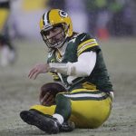 Green Bay Packers' Aaron Rodgers reacts after being sacked by San Francisco 49ers' Arik Armstead during the second half of an NFC divisional playoff NFL football game Saturday, Jan. 22, 2022, in Green Bay, Wis. (AP Photo/Aaron Gash)