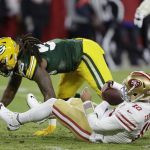Green Bay Packers' Za'Darius Smith sacks San Francisco 49ers' Jimmy Garoppolo during the first half of an NFC divisional playoff NFL football game Saturday, Jan. 22, 2022, in Green Bay, Wis. (AP Photo/Matt Ludtke)