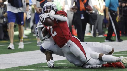 Arizona Cardinals running back Chase Edmonds (2) is tackled by Dallas Cowboys' Micah Parsons during...