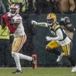 San Francisco 49ers' Jauan Jennings catches a pass in front of Green Bay Packers' Rasul Douglas during the second half of an NFC divisional playoff NFL football game Saturday, Jan. 22, 2022, in Green Bay, Wis. (AP Photo/Morry Gash)