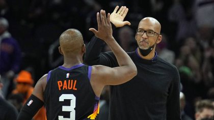 Phoenix Suns coach Monty Williams and guard Chris Paul (3) reacts after a timeout during the second...