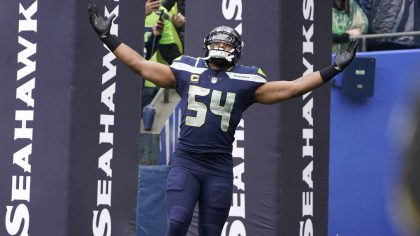 Seattle Seahawks linebacker Bobby Wagner reacts as he runs out of the tunnel before an NFL football...