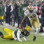 San Francisco 49ers' Jauan Jennings catches a pass in front of Green Bay Packers' Rasul Douglas during the second half of an NFC divisional playoff NFL football game Saturday, Jan. 22, 2022, in Green Bay, Wis. (AP Photo/Matt Ludtke)